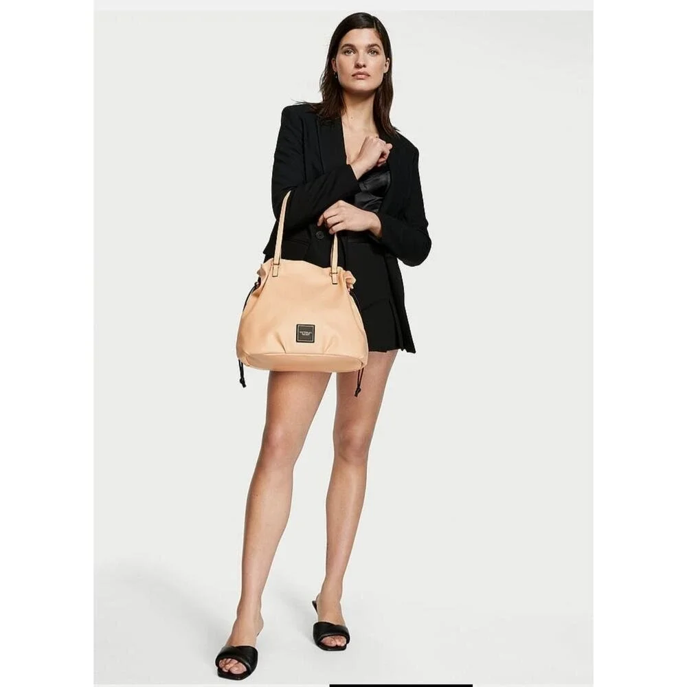 Victoria's Secret Beige Drawstring Tote Bag Faux Leather Shoulder Bag Logo Patch